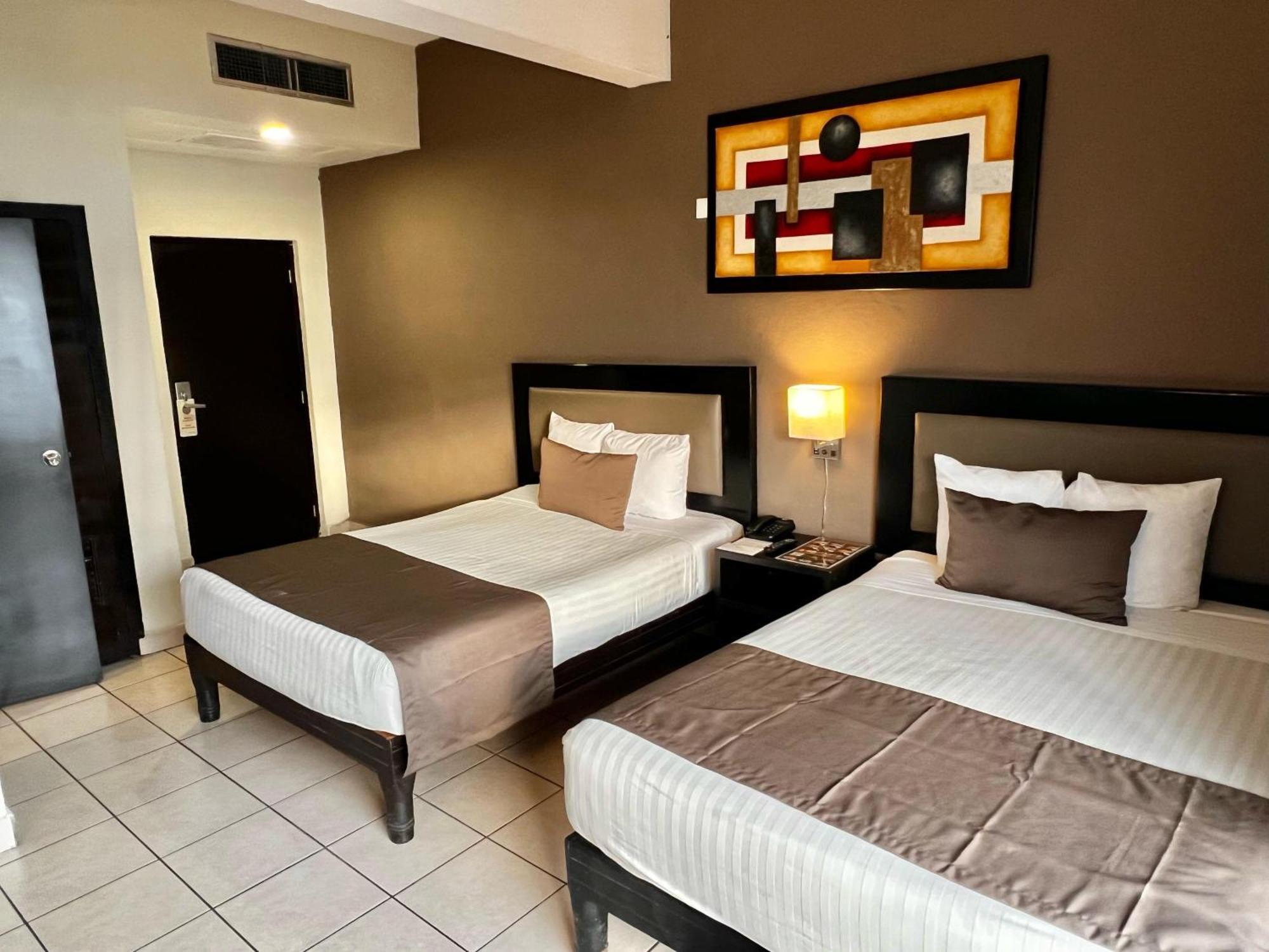 Hotel La Siesta Malecon Мазатлан Номер фото