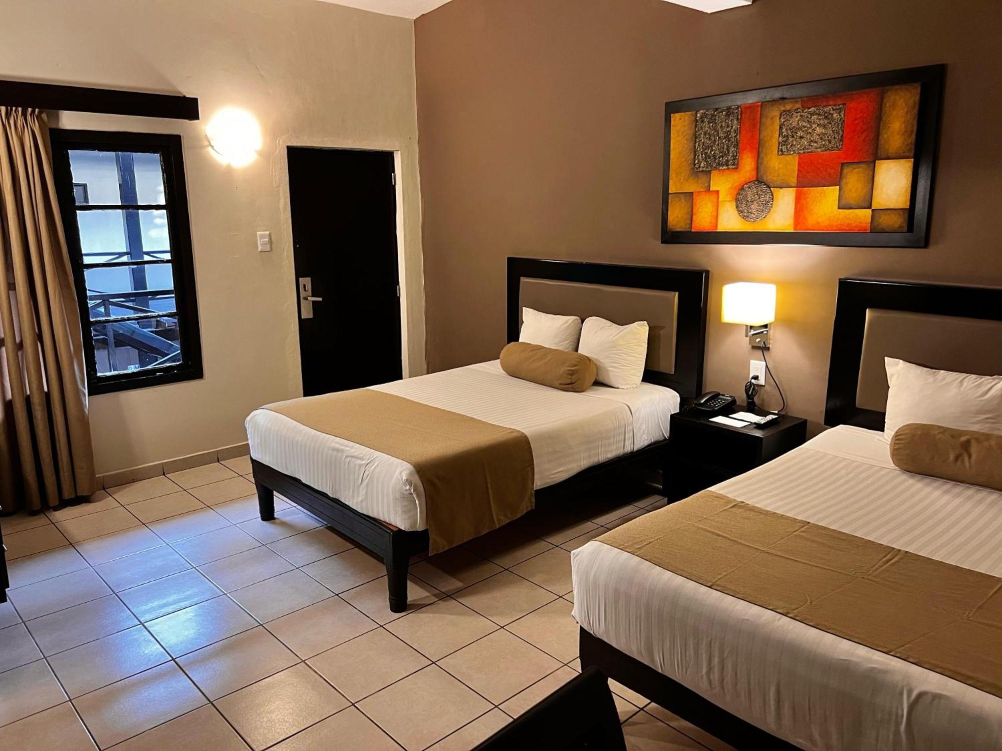 Hotel La Siesta Malecon Мазатлан Номер фото